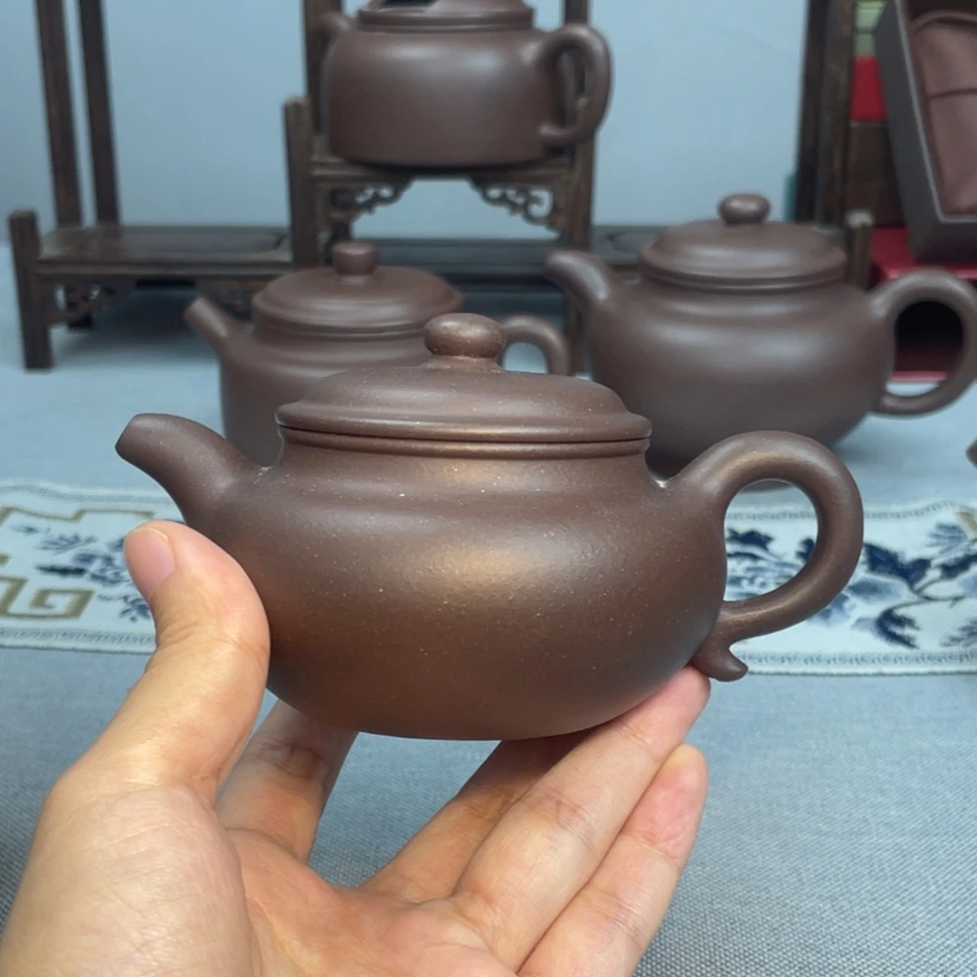 知***鸟茶杯紫砂底槽清 小仿古 150CC