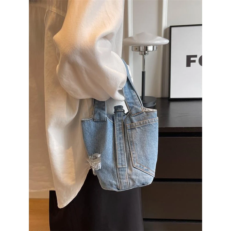 牛仔布菜篮子水桶包包女随性简约休闲大容量百搭拼色口袋手提包