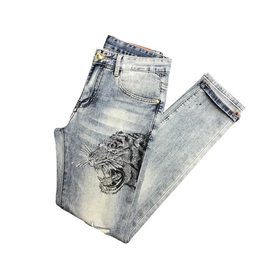 罗尔基那斯高端时尚虎头烫钻牛仔裤男士潮牌欧货破洞修身春秋新款