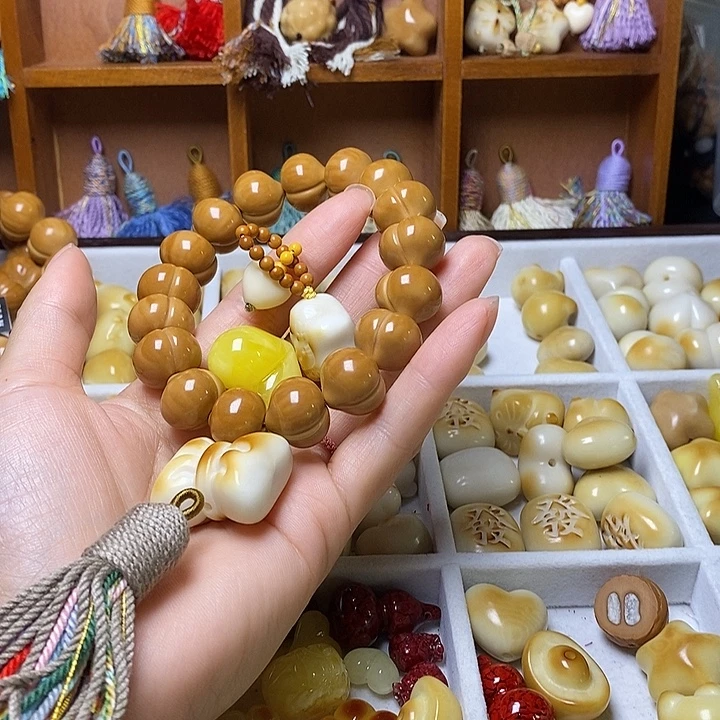 洋***猴头核桃吊坠爱心星星流苏