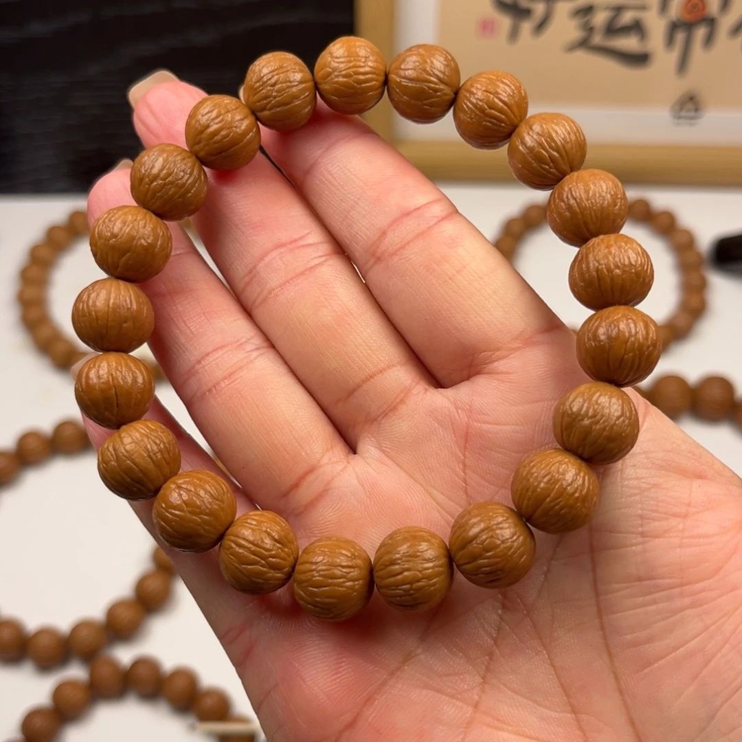 心***峰猴头核桃吊坠凤羽