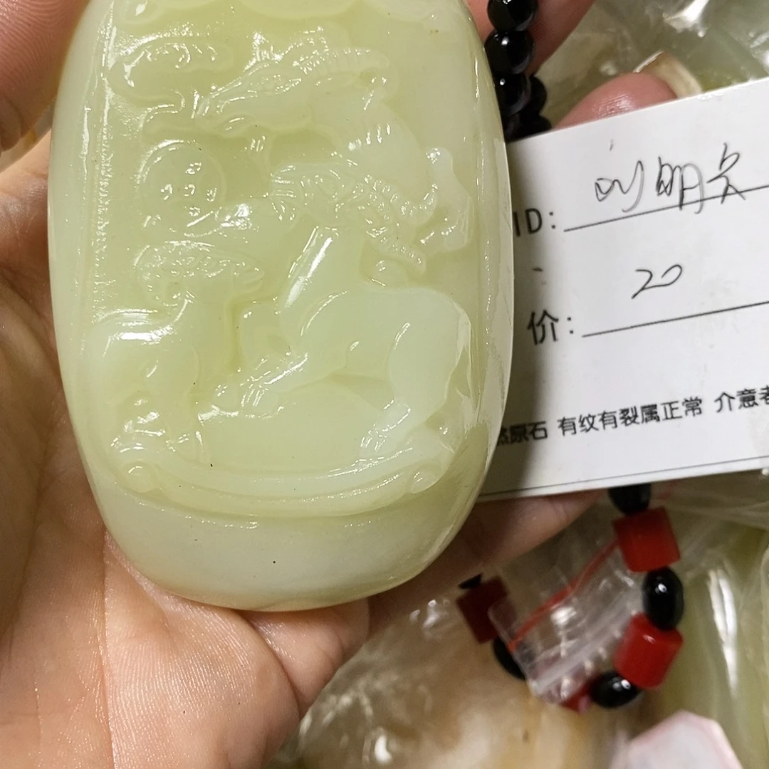 石材刘*兵古青石手把件