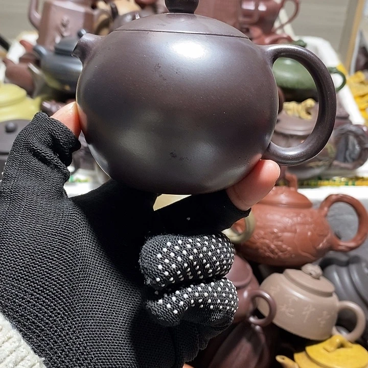 紫砂茶壶微瑕微笑