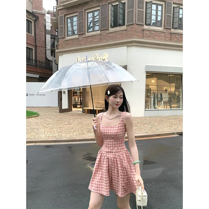 韩系甜美俏皮吊带连衣裙女夏季新款少女感收要显瘦格纹A字短裙子