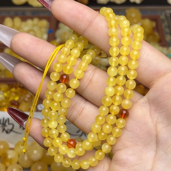 蜜蜡未镶嵌珠宝奇石鸡油黄满蜡妖花108颗卡5+ 微微瑕
