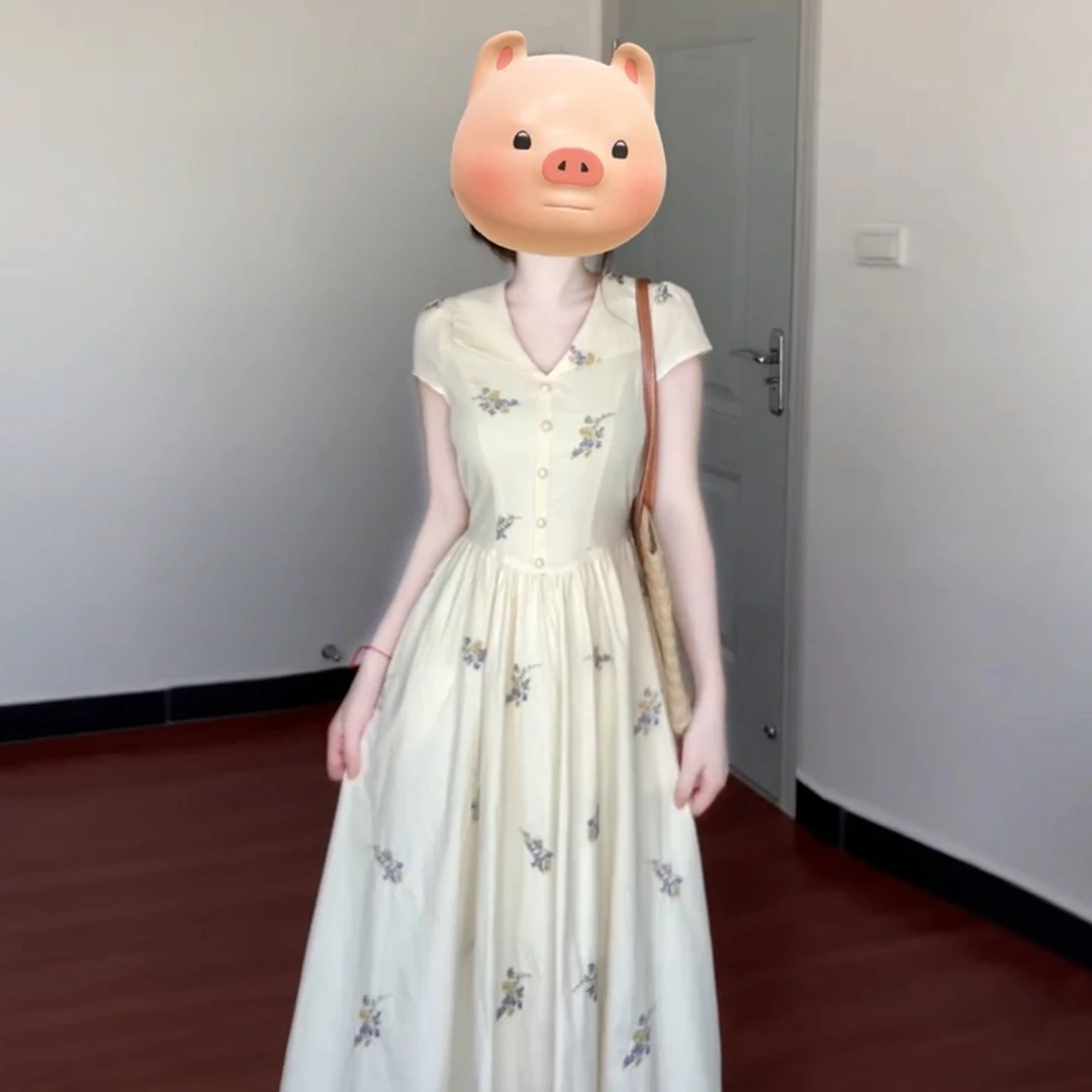 温柔风杏色碎花polo领短袖连衣裙子女夏2025法式气质绝美长裙3861