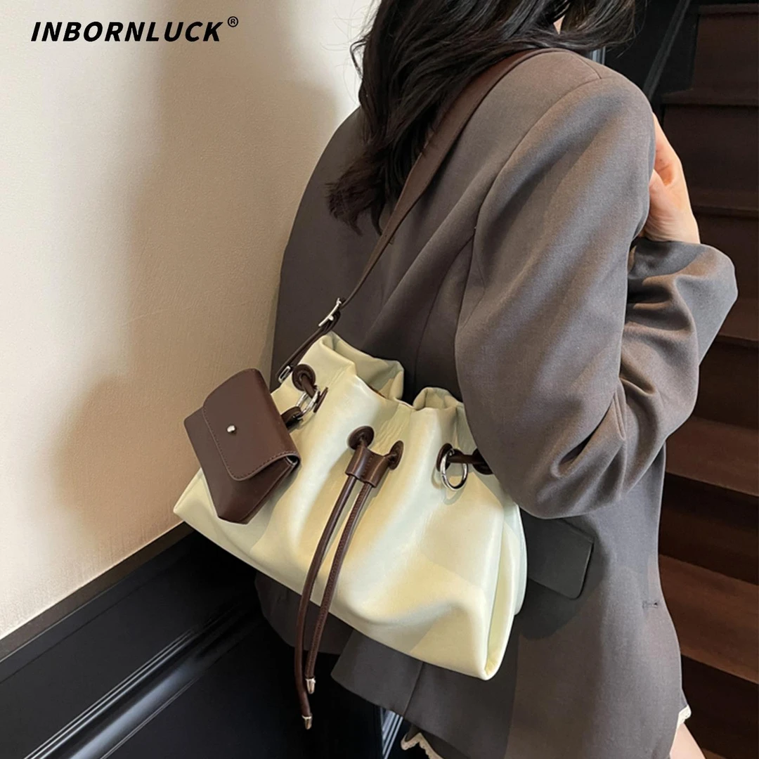 大容量包包女夏季2025新款时尚小众设计单肩斜挎包抽绳褶皱水桶包