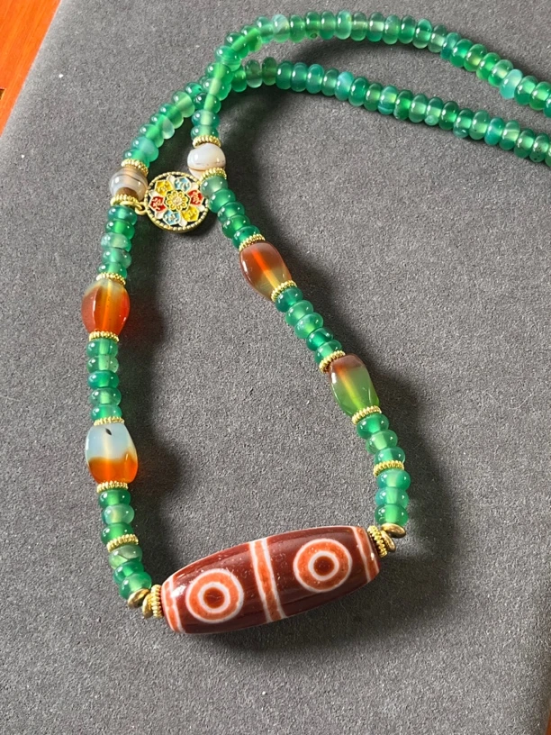 藏式四眼红肉玛瑙玉髓吊坠真品正品生肖脖挂男女定制绳合金