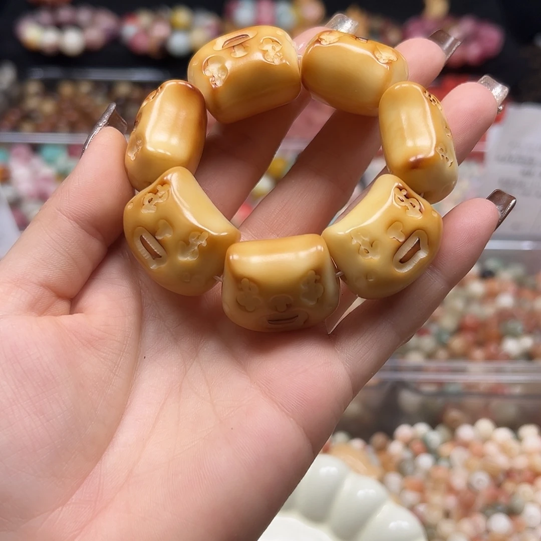 菩提根/象牙果手串瑕疵炭烤美金猫1条表面孔道有裂