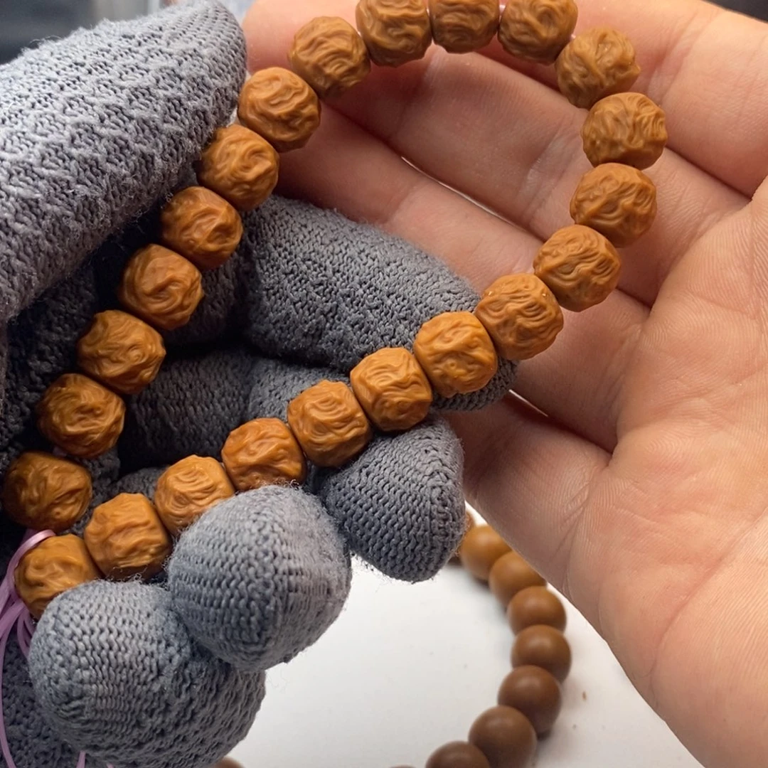 刘***超猴头核桃手串龙蛇