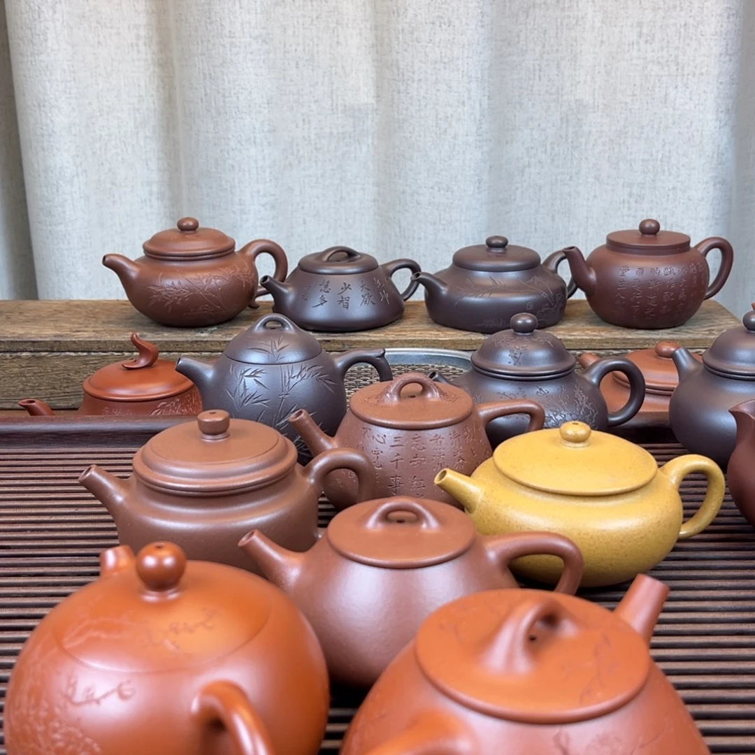 邱***缙紫砂茶壶西施石瓢