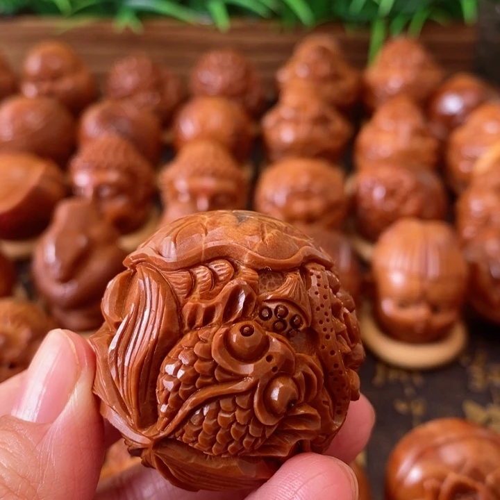 橄榄核把件L****…巴西进口大橄榄鱼手工