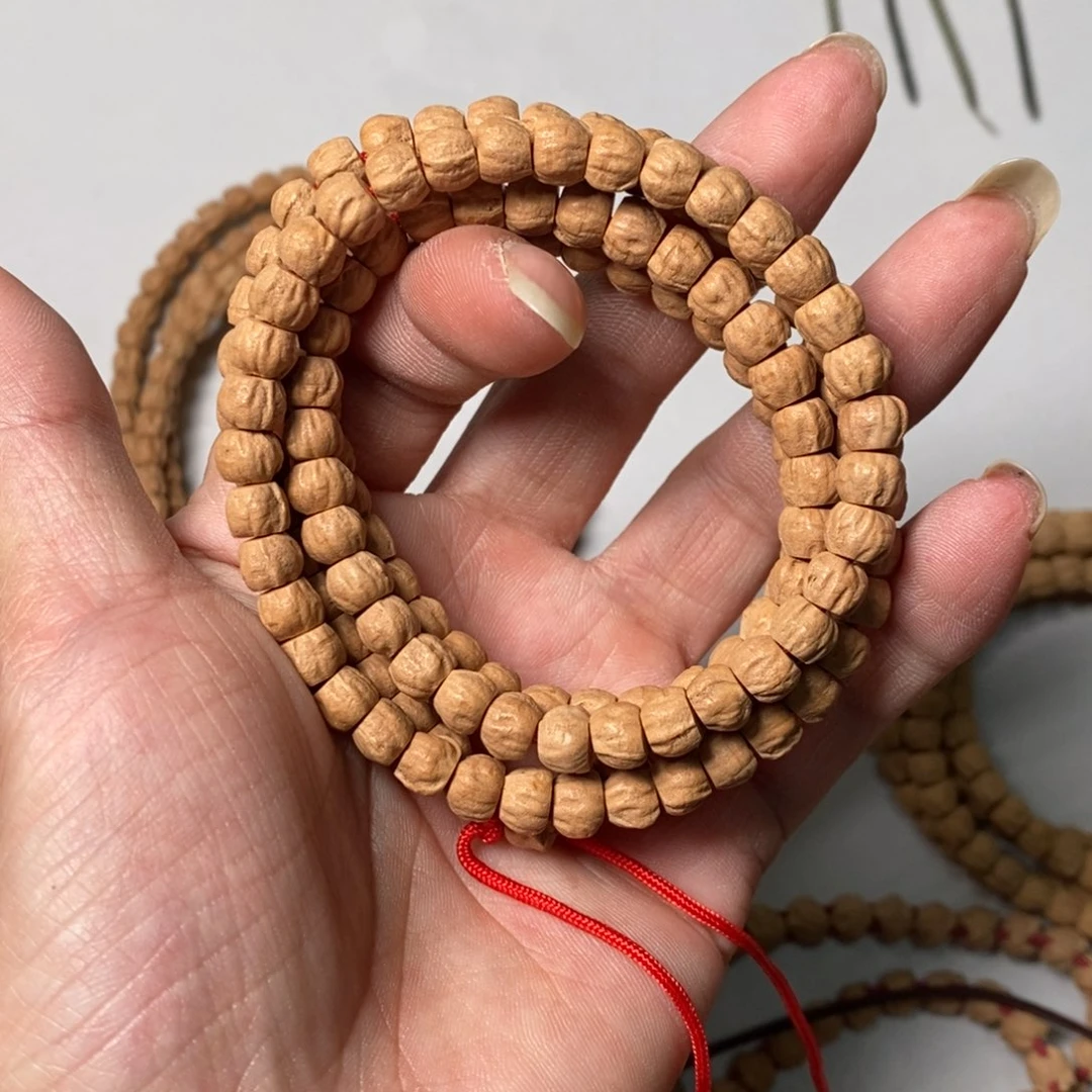 吊坠柏香籽/百香籽6.5毫米红皮直切