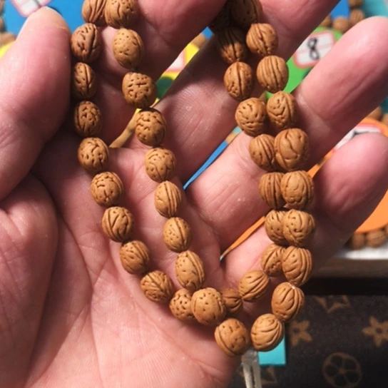 磊***桃核手串野生桃核两条58米