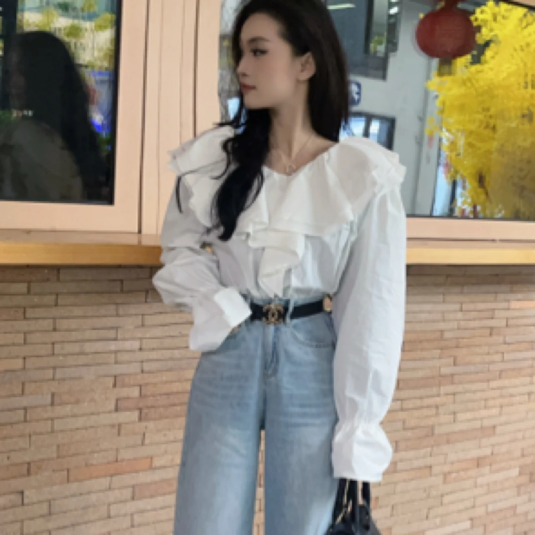 荷叶边白色女衬衫春秋高端欧货不规则衬衣气质减龄一字长袖上衣