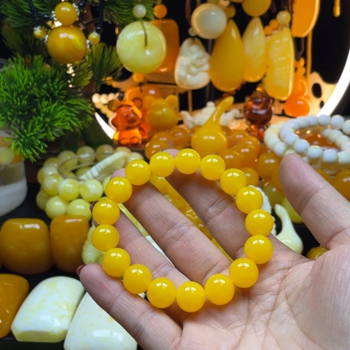 星***海非金属鸡油黄12手串