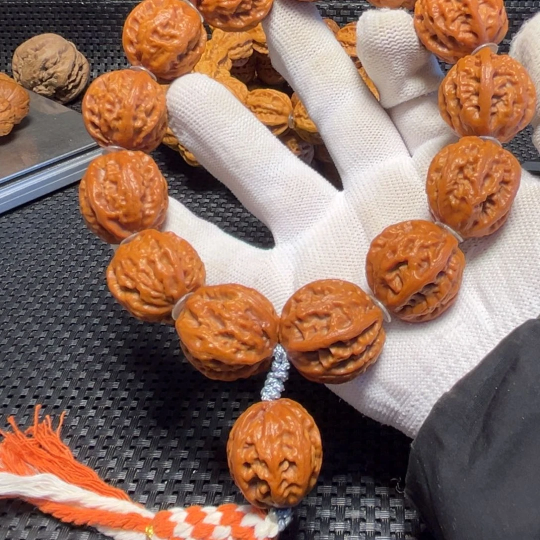 文玩核桃吊坠那*正圆粗筋京八棱25