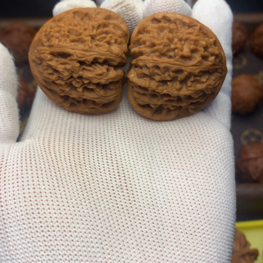 桃核把件40微修红皮南疆