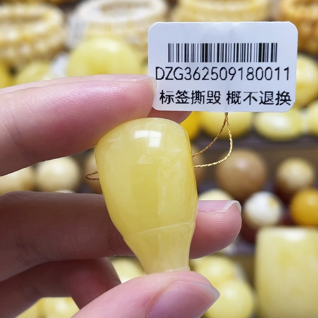 裸石琥珀未镶嵌16*27mm浓蜡三通瑕