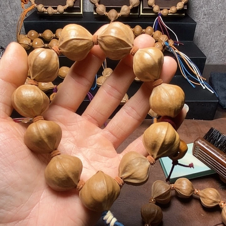 聽***說手串/手链橄榄核四花24