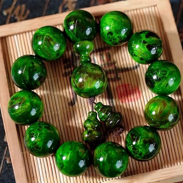 丹青琥珀木瘤疤手串男长白山男女同款全透光血龙木原木手串手链