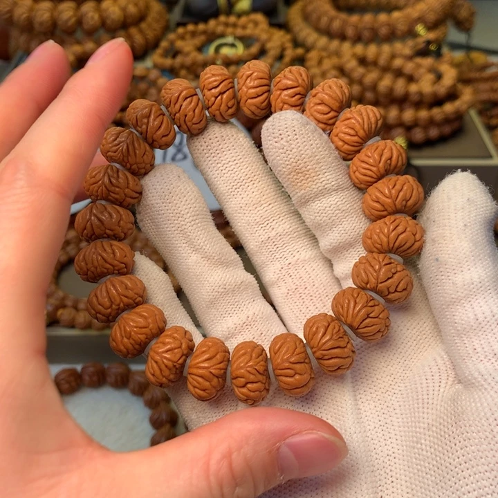 学***的手串桃核秦岭龙纹