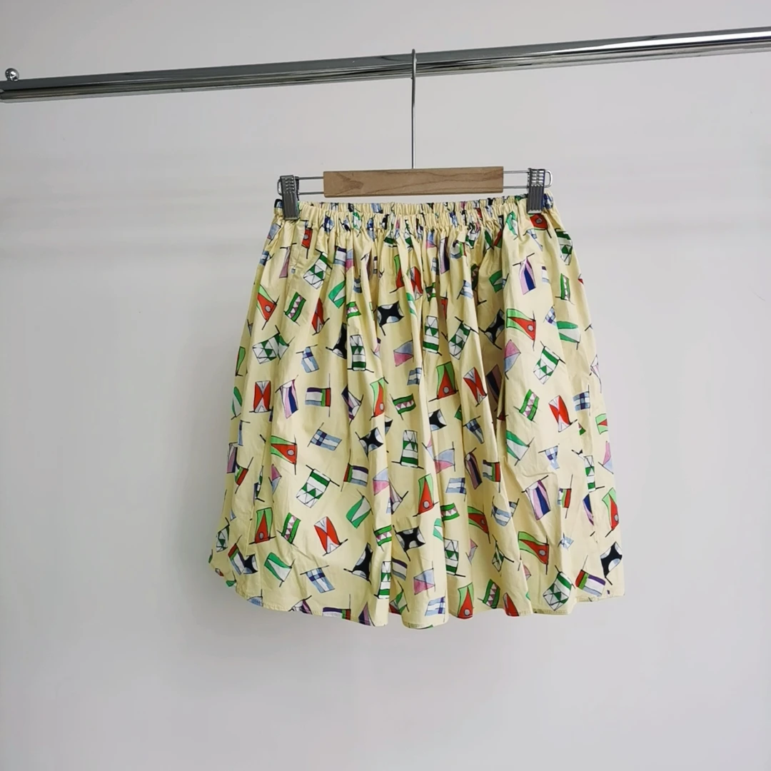 I212 黄色印花百褶双口袋休闲半身裙