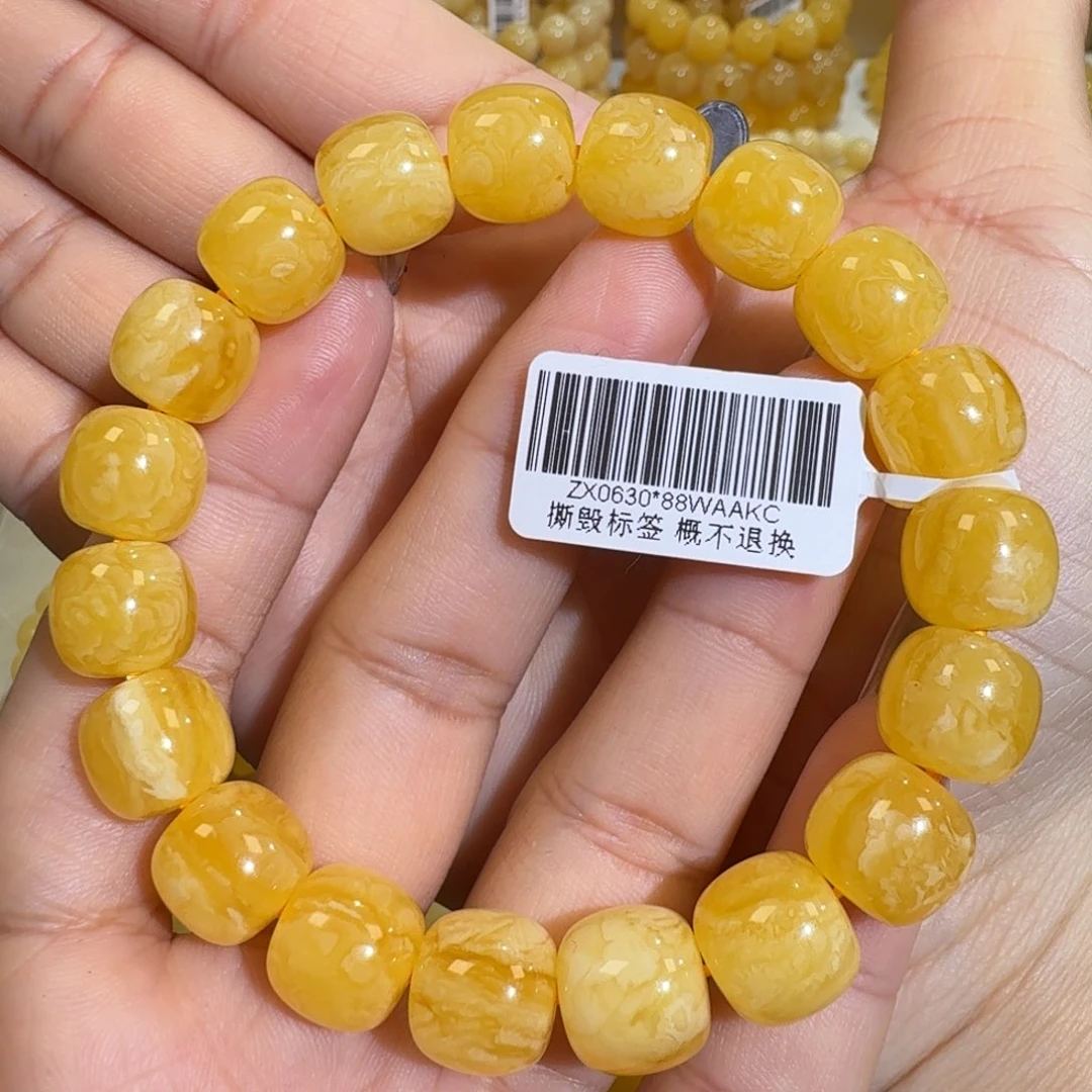 琥珀未镶嵌珠宝奇石11.8m焦皮同料橘黄花蜡手串18.9