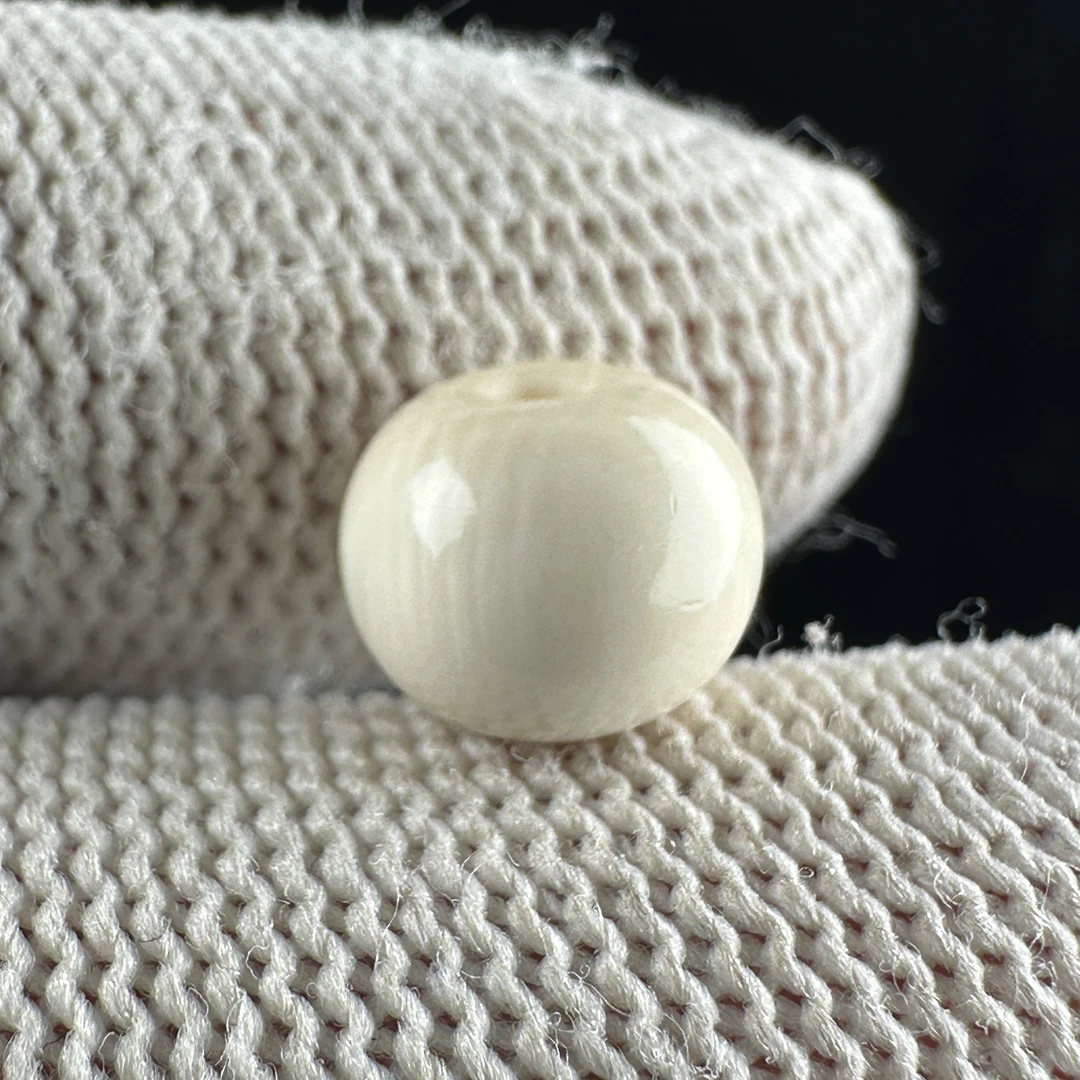 K2718天然猛犸 墩子扣子9*7.5mm一物一图 假一罚十