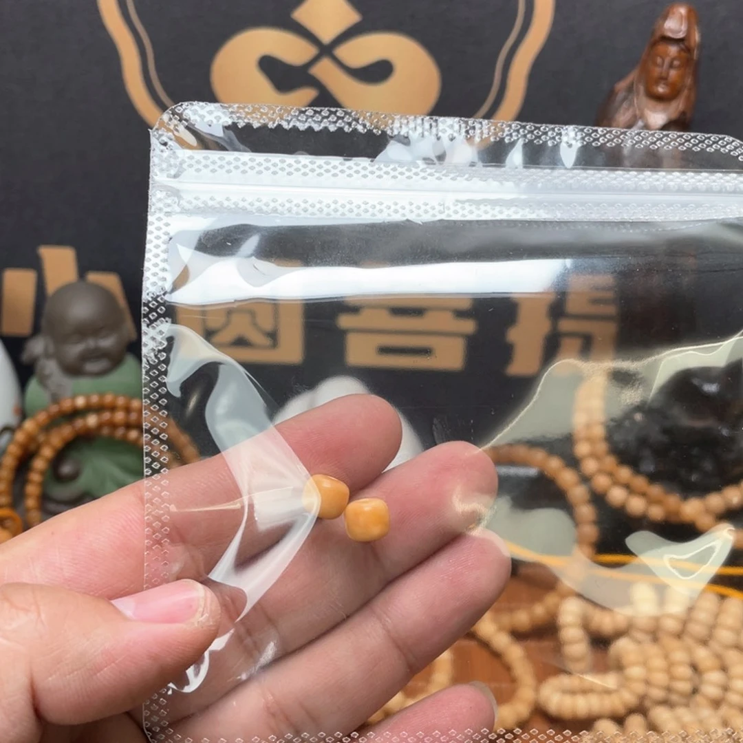 龙眼菩提吊坠弓*舟龙脊菩提8*7老邢玉化2粒