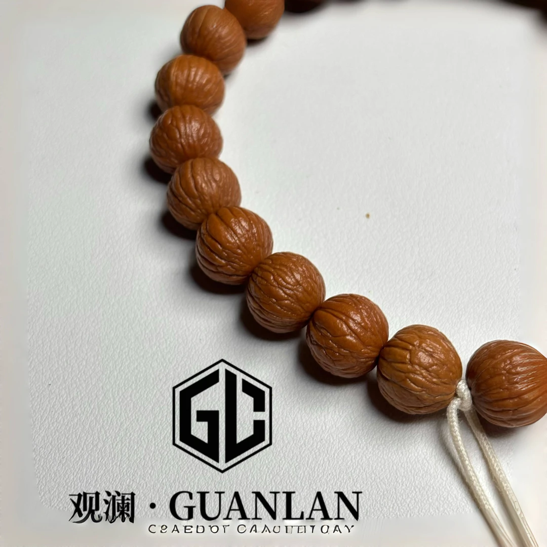 【观澜凤羽】原皮原色凤羽猴头核桃手串尺