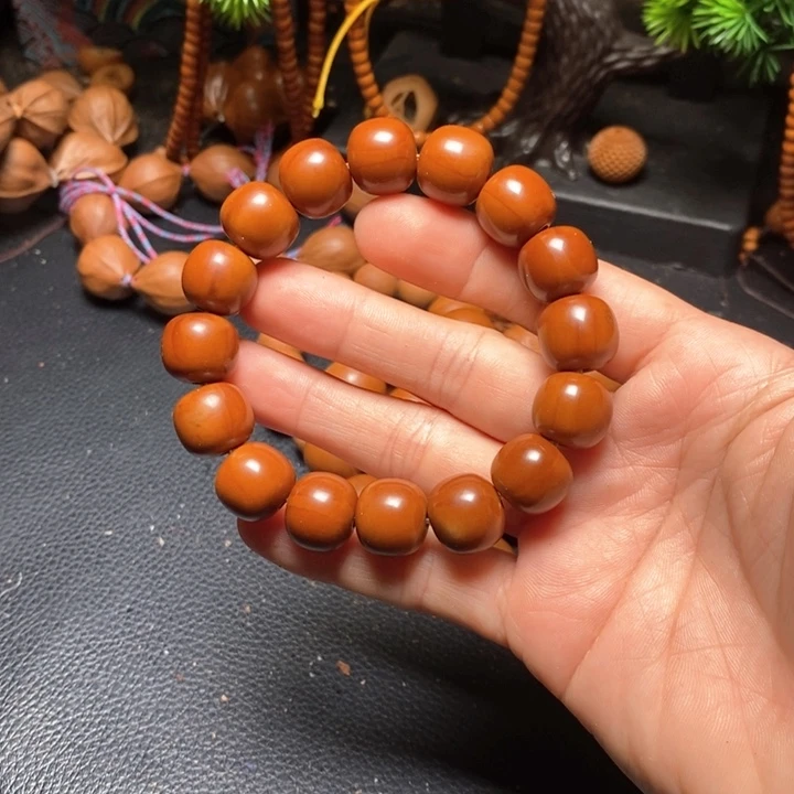 橄榄核手串淡**尘1.4老型桶珠