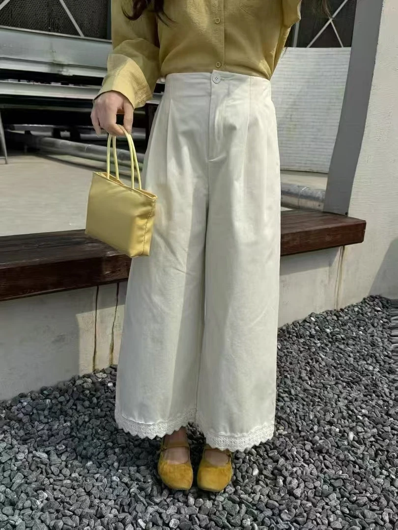 小橙子 牛仔花边裤