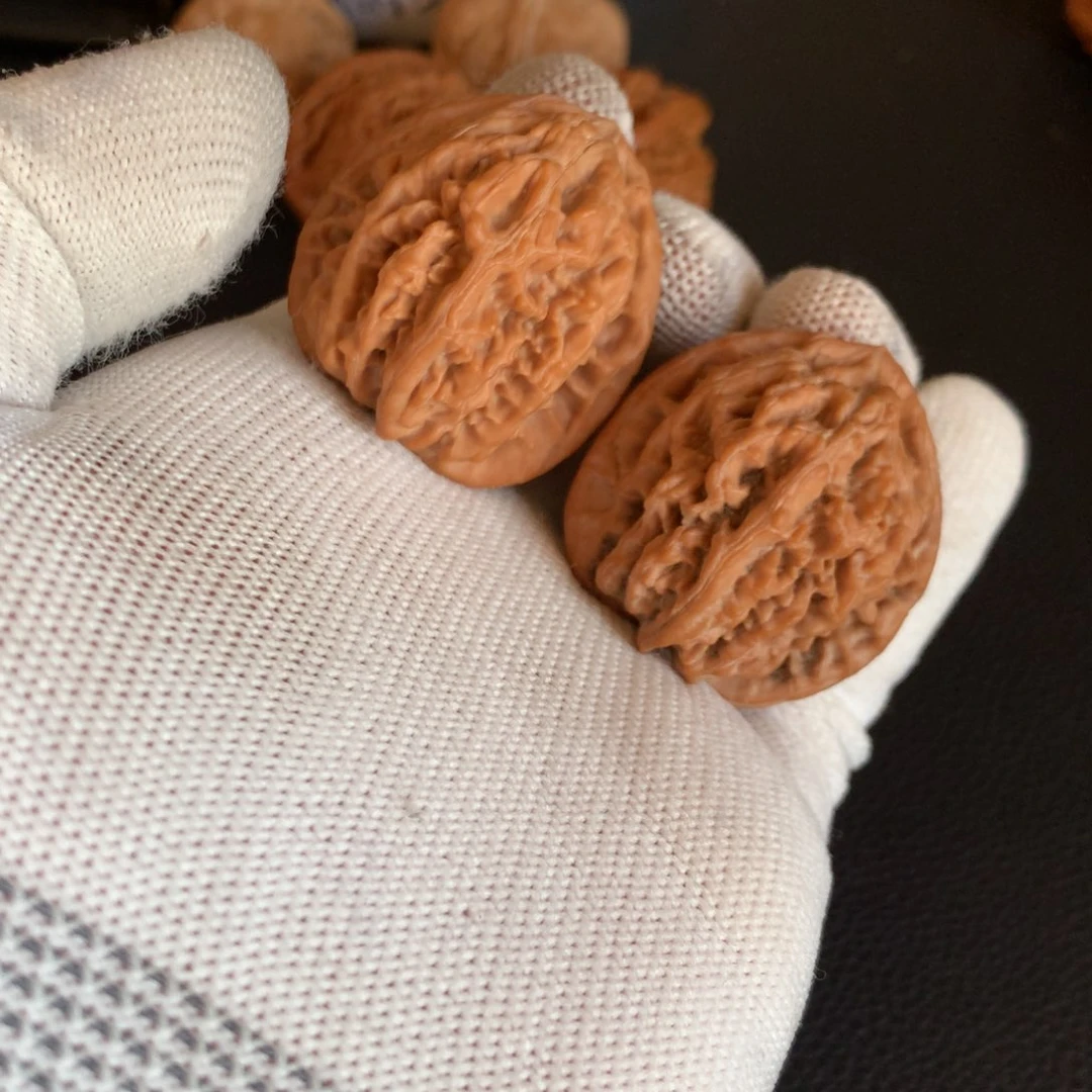 文玩核桃把件藤***面饕餮纹36