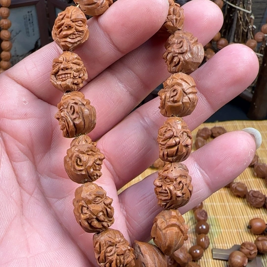 纯手工雕刻龙纹桃核吞噬怪脸恶僧