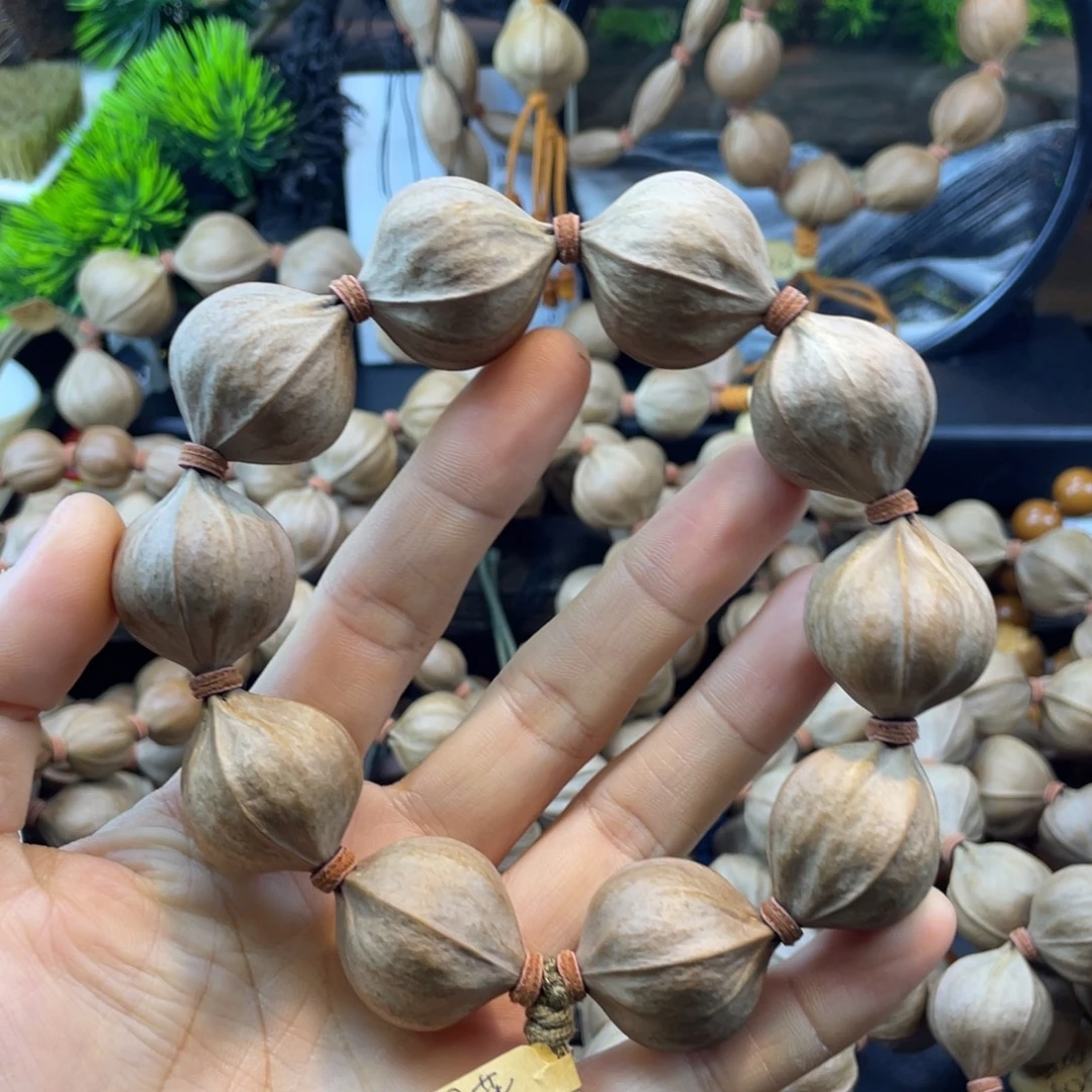 大***@吊坠橄榄核2528铁核四花