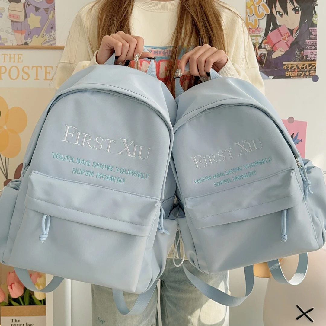 高颜值天空蓝双肩包ins风初高中极简风书包休闲旅行百搭双肩包