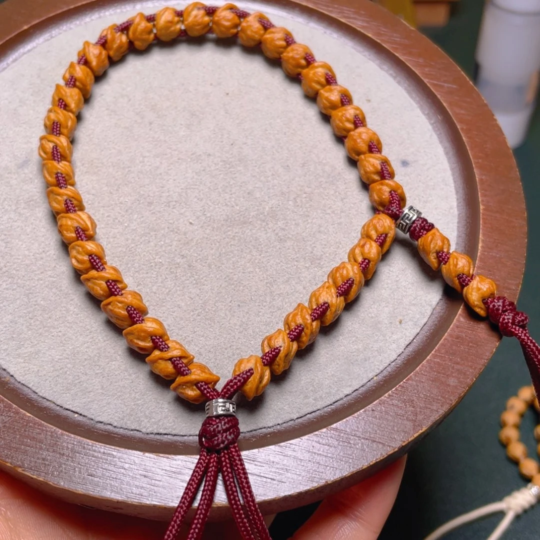 吊坠柏香籽/百香籽蛇骨手持配饰