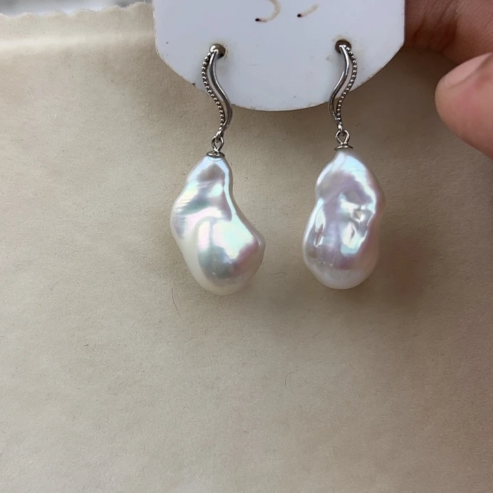 银S925镶嵌淡水珍珠耳饰娜****）