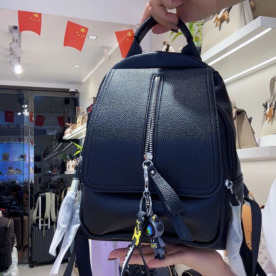 PU稻草人黑色背包