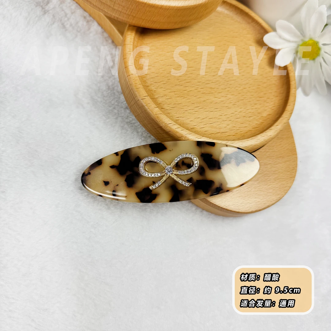 2407韩国高端醋酸豹纹蝴蝶结简约弹簧夹气质经典款法系高级感