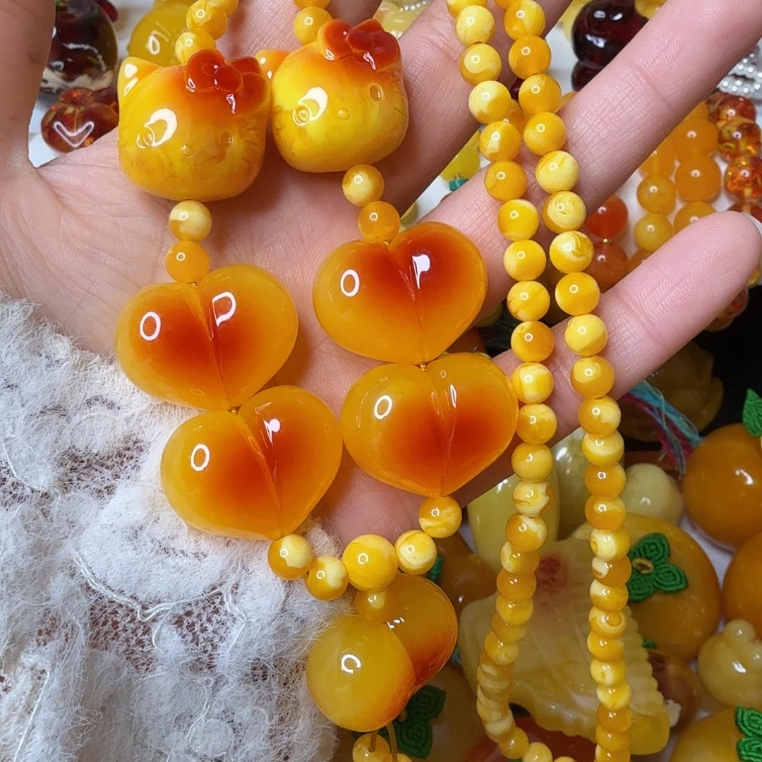 ****话非金属屁桃猫头毛衣链