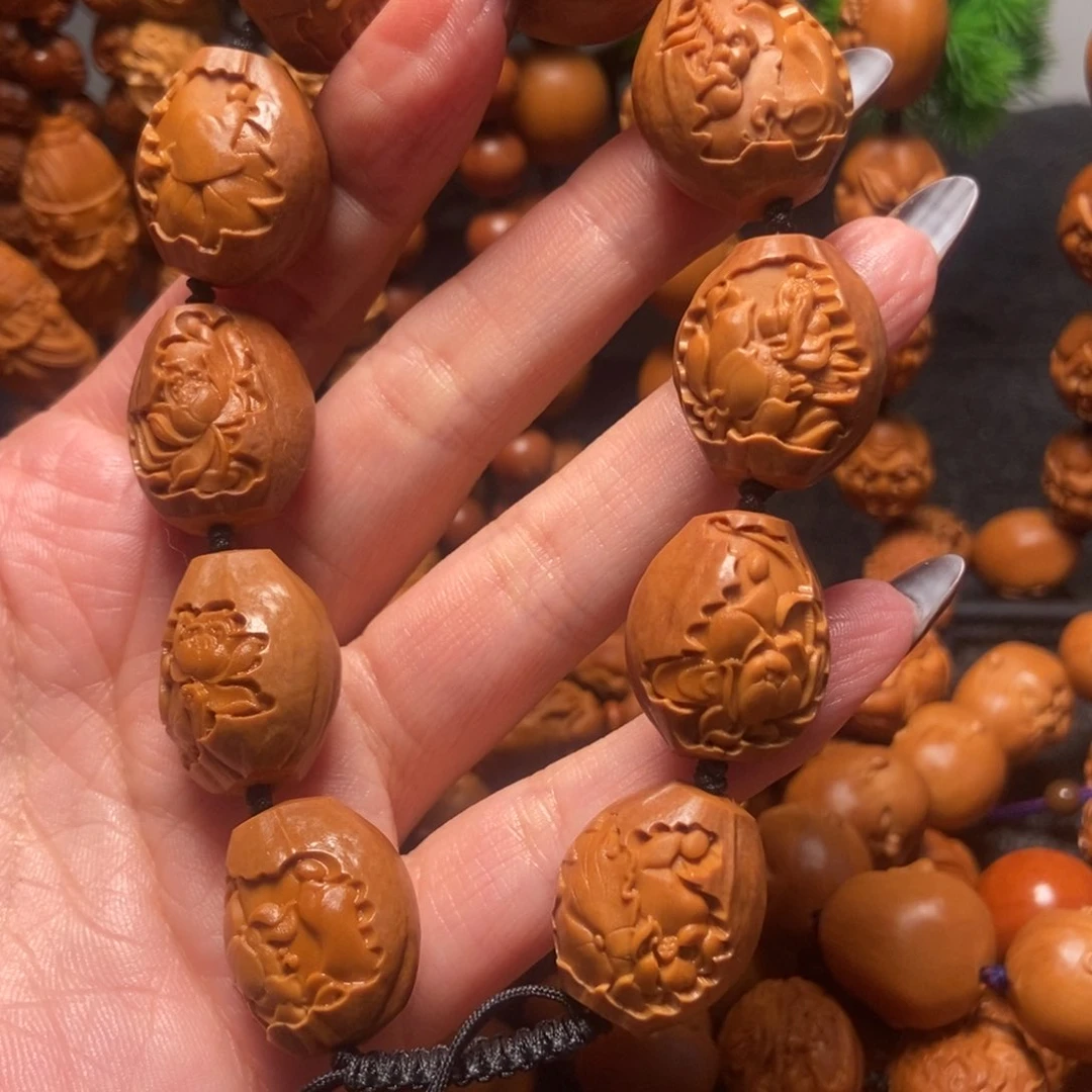 橄榄核吊坠包衣无相佛