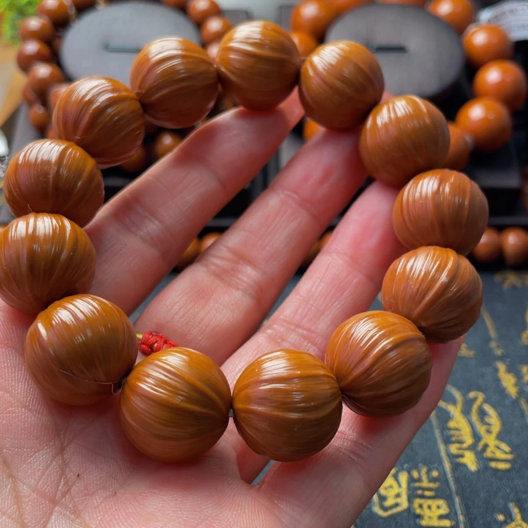 杏***衣橄榄核吊坠橄榄1.8