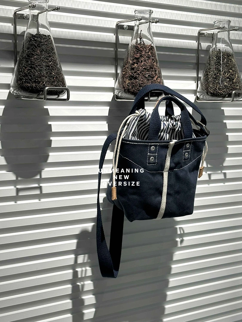 UNMEANING没意思/水洗帆布斜挎包日系百搭手提包迷你桶包