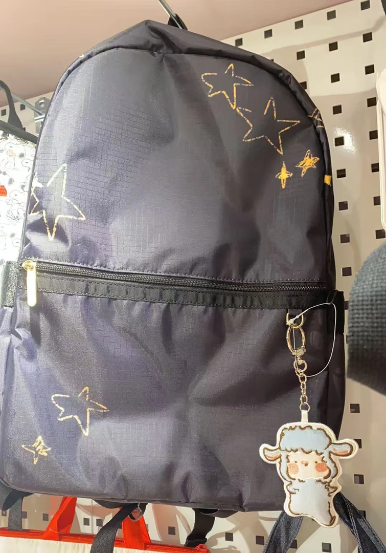 卡通印花双肩包 带包挂