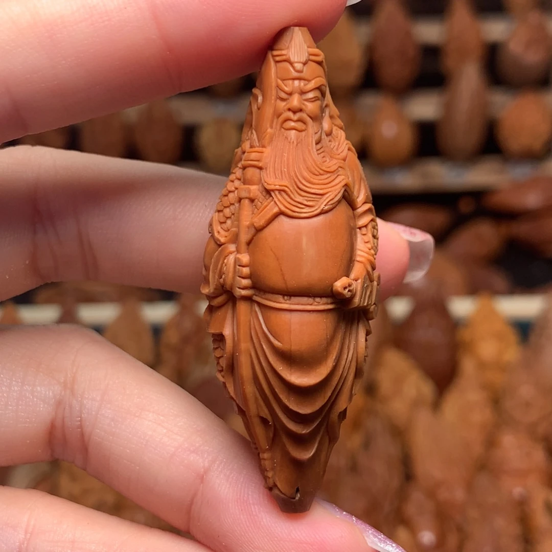 把件橄榄核豆*立刀关公