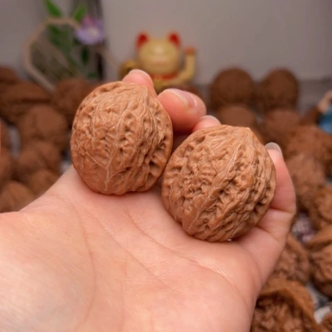 吊坠文玩核桃铁锤手捻有点黄