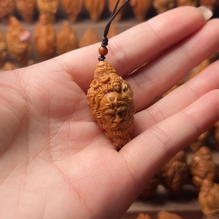 橄榄核吊坠曾***锅橄榄核