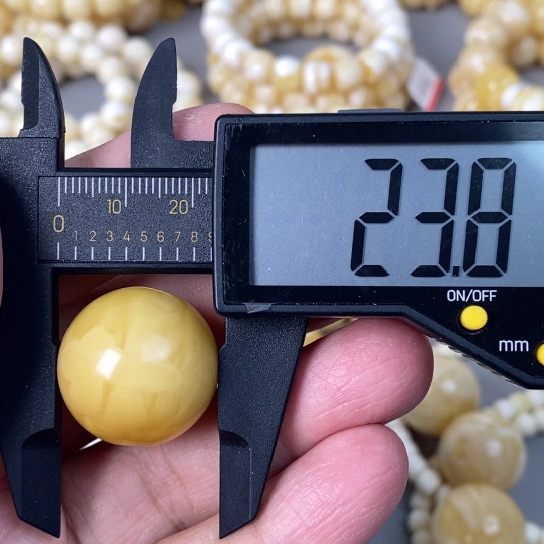 未镶嵌蜜蜡珠宝奇石7.6g  孔道轻微花粉